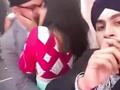 Punjabi boys having fun with a girl in public